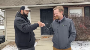 inspector and realtor fist bumping