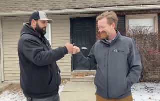 inspector and realtor fist bumping