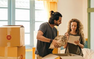 Couple with moving boxes